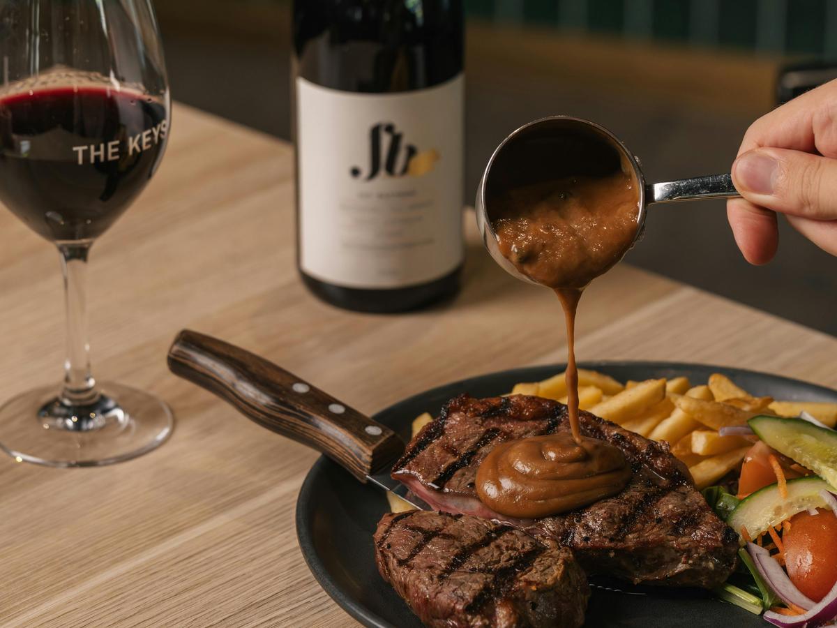Elevate your dining experience with the Cross Keys Hotel’s succulent steak and local wines.