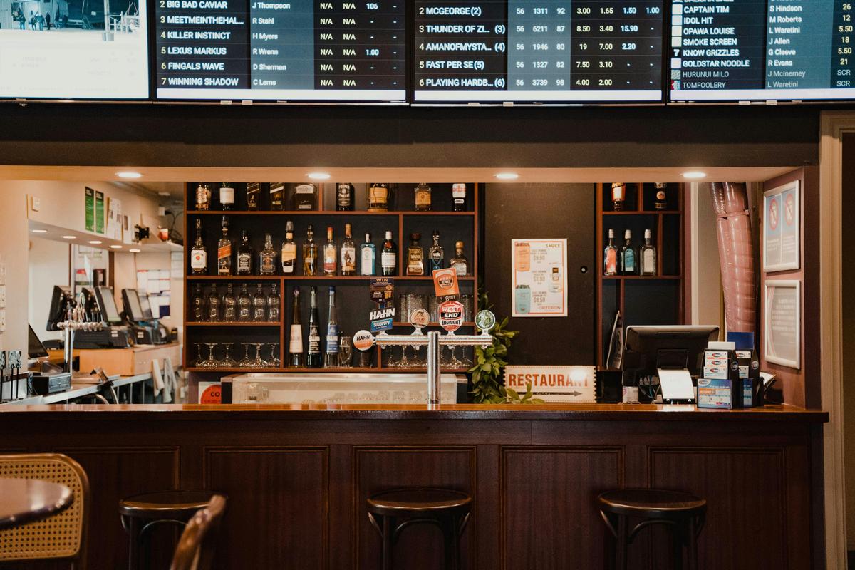 Unwind with your favorite beverage in the Criterion Tavern’s warm and inviting bar area.
