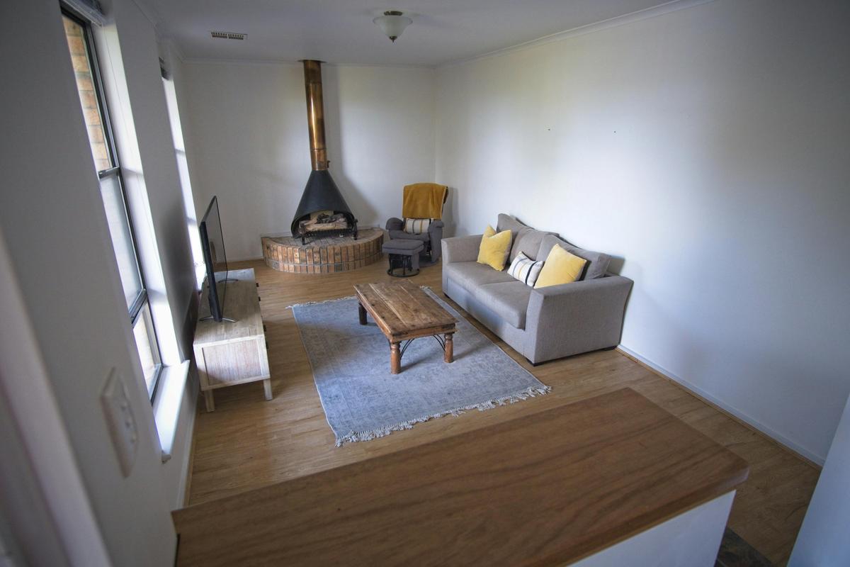 Spacious Living Room With Fireplace