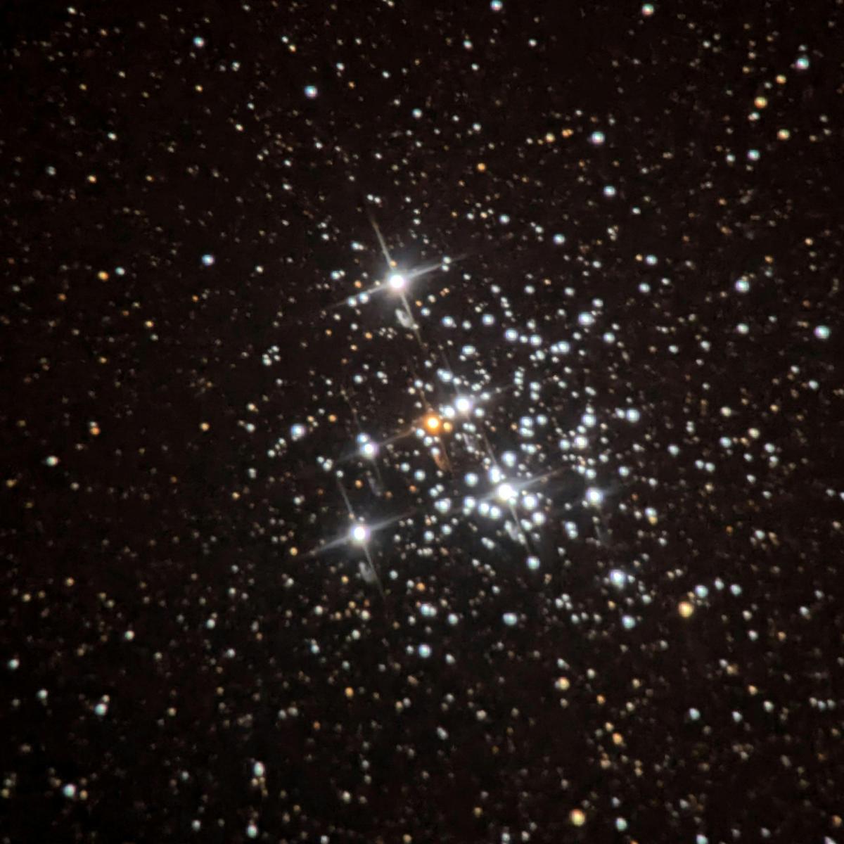 Mobile phone view of a star cluster through our telescope