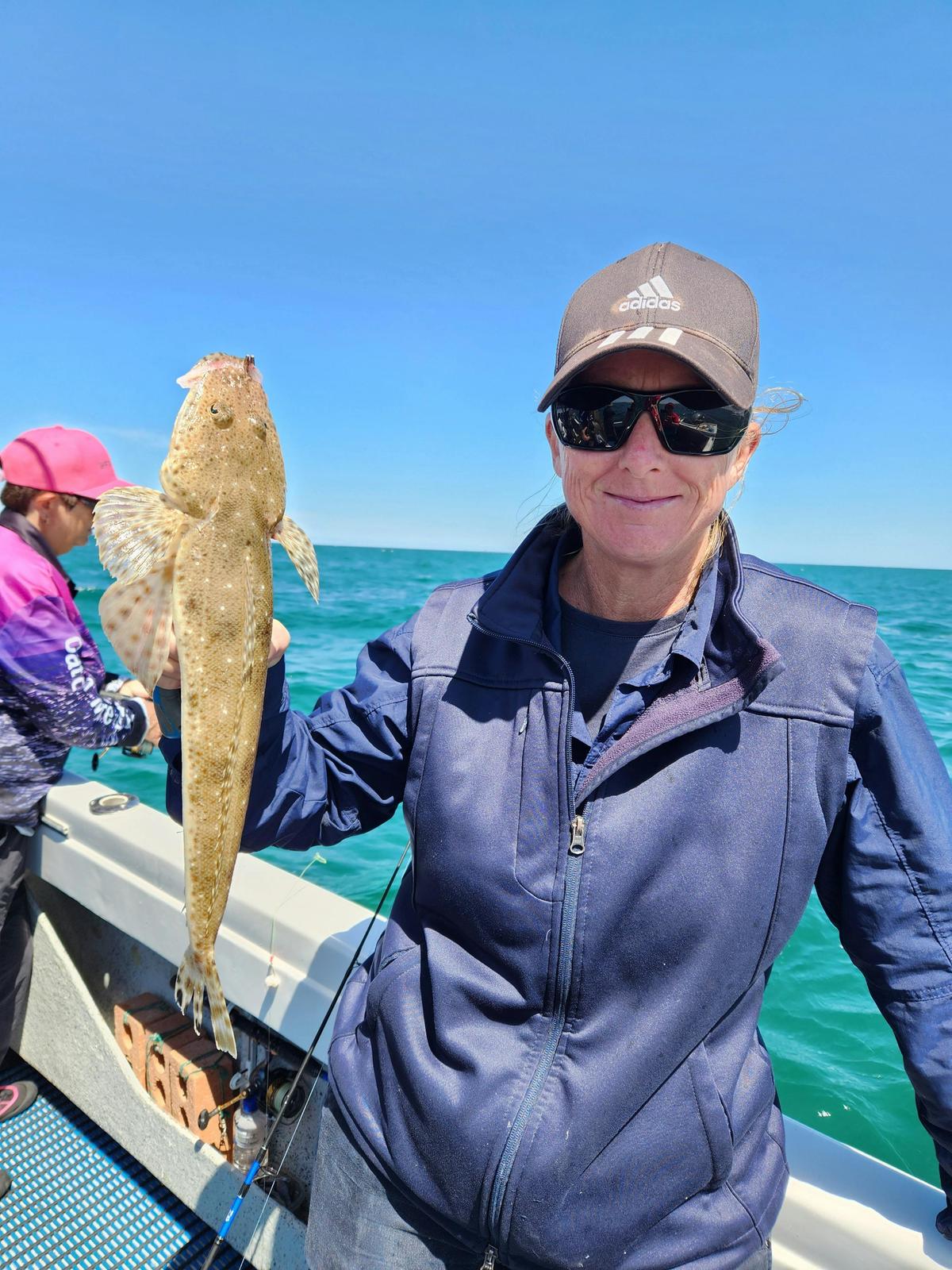 Lisa caught a nice Flathead when fishing with Skip in Adelaide