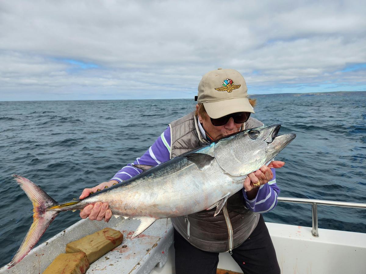 Wendy caught her first Southern Blue Fin Tuna at age 77 on a fishing trip with Skip in SA