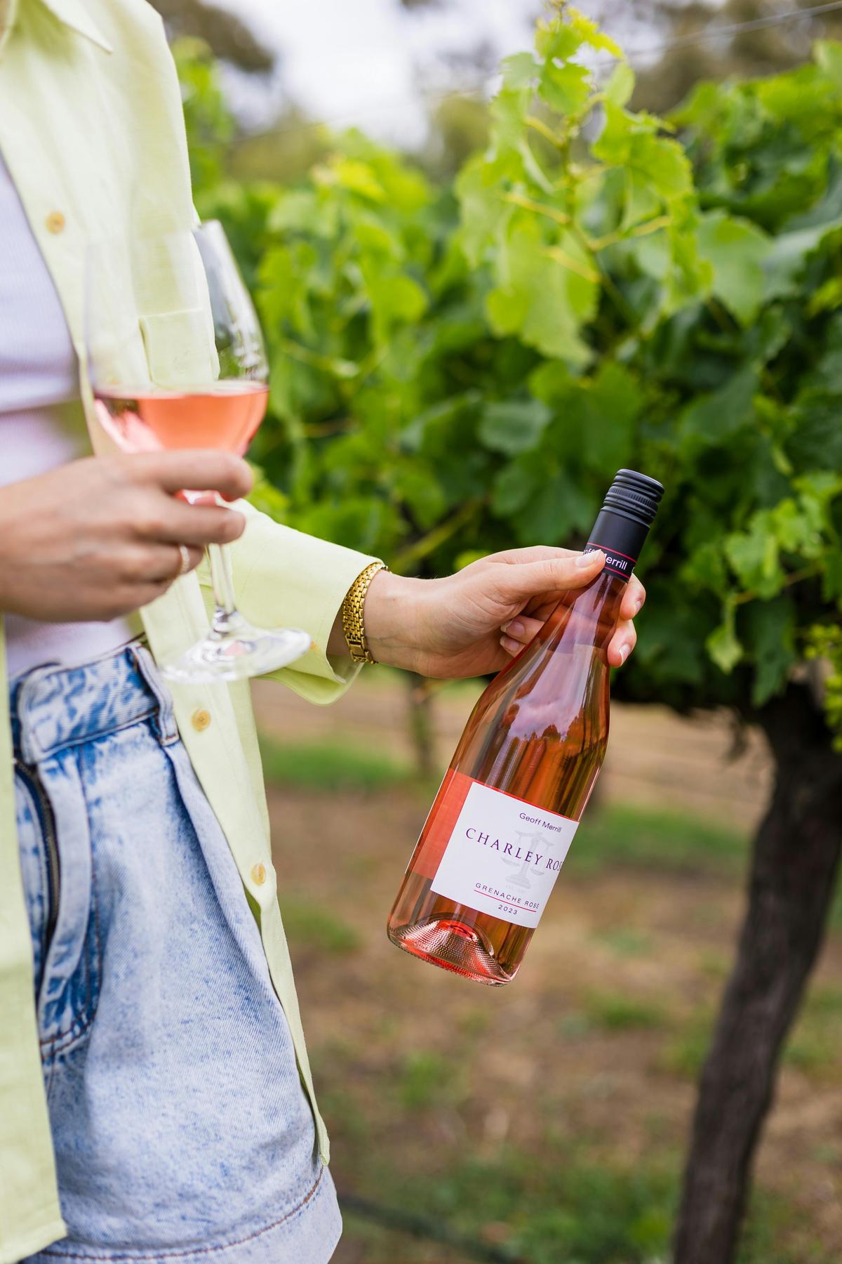 Charley Rose Bottle in the vineyards
