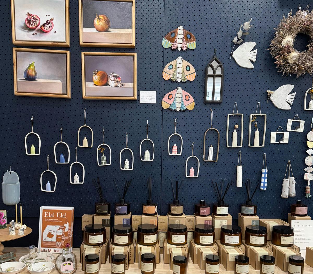Art wall! A collection of artworks, ceramic wall hangings.