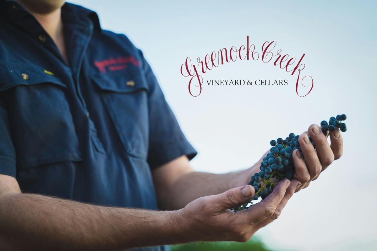 Winemaker hold grape