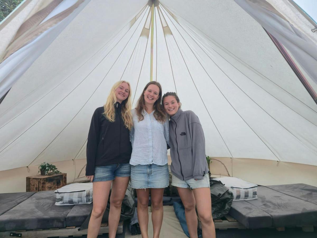 Girls in bell tent on tour