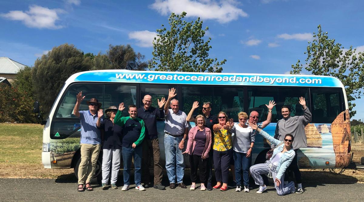 Group of passengers in front of the bus