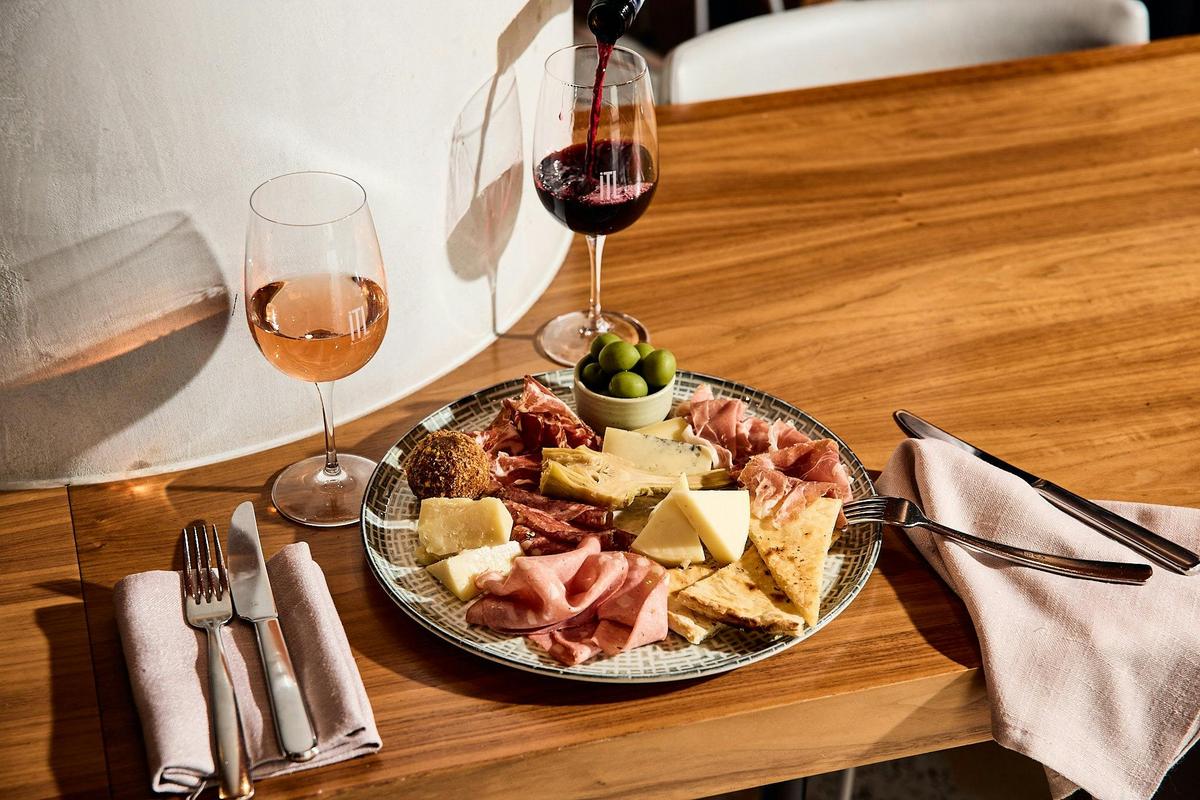 Antipasti platter and wine
