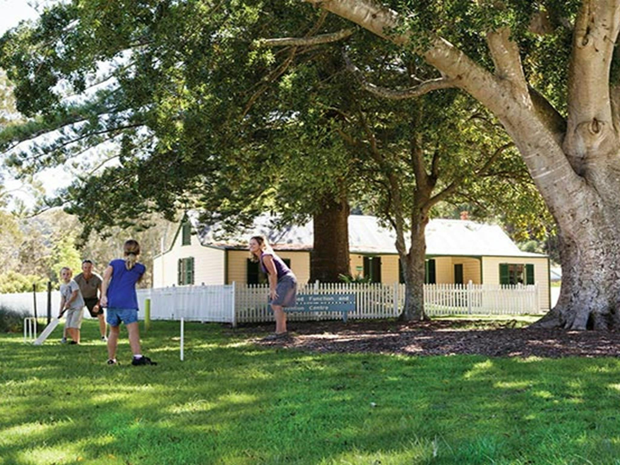 Family playing cricket at The Basin picnic area. Photo: David Finnegan &copy; OEH