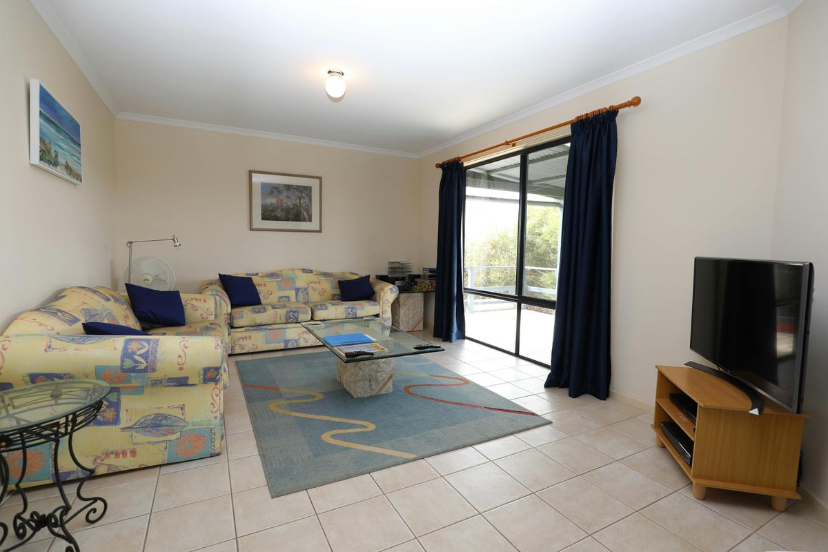 Lounge area with widescreen TV