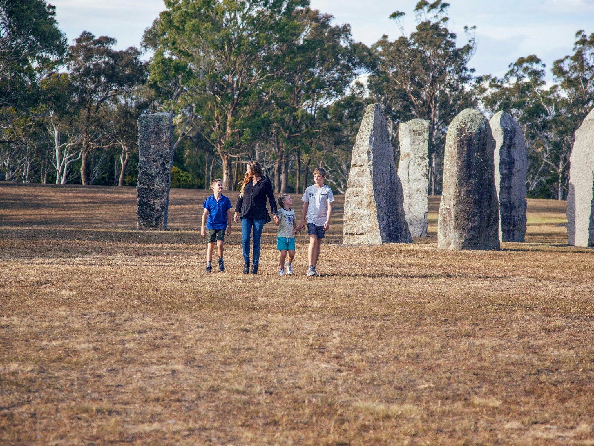 Family exploring the Australian Standing Stones