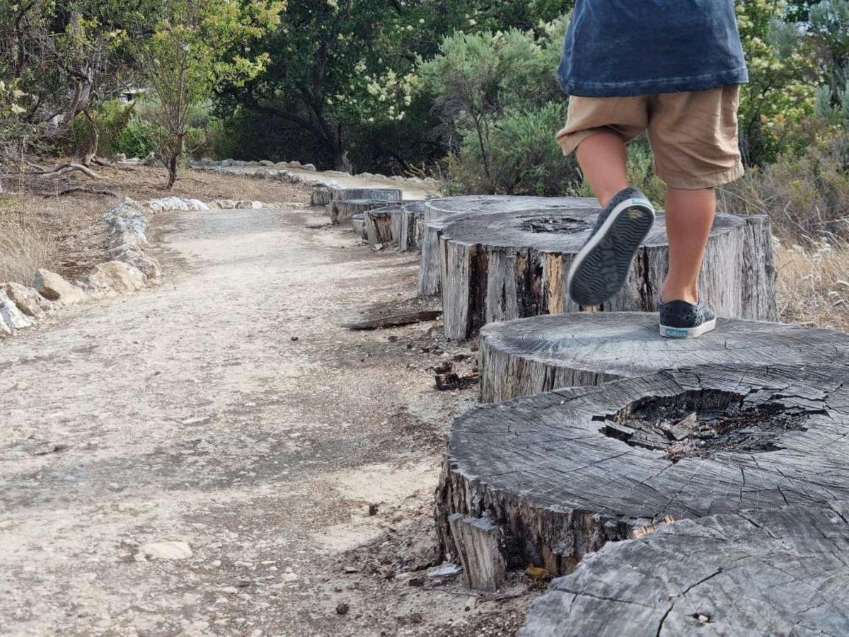 Child exporing the Kangaroo Island Sculpture Trail