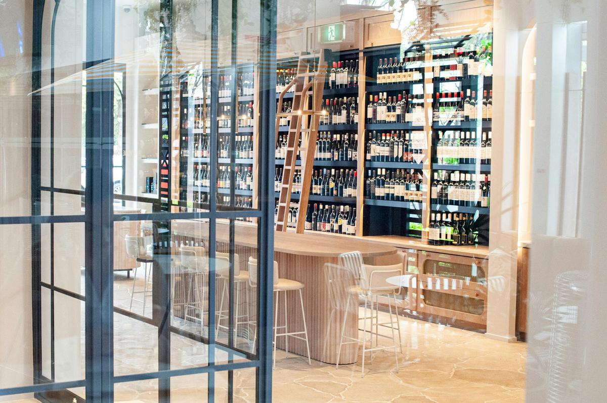 The Lion Wine Room offers a curated selection of fine wines to enjoy in a chic setting or at home.