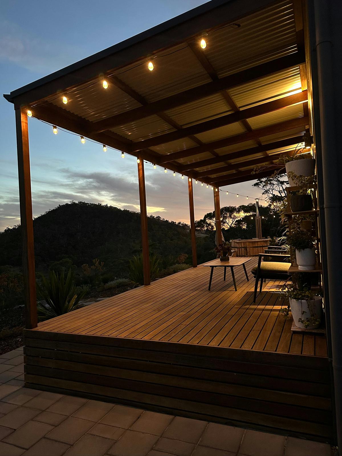Off grid sustainable tiny house with view and wood fire hot tub