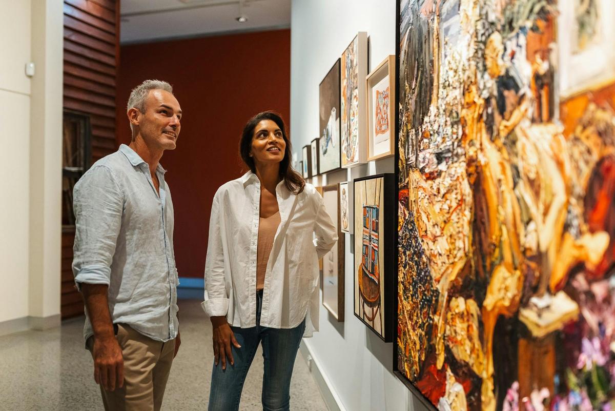 Visitors viewing artworks at the Tweed Regional Gallery & Margaret Olley Art Centre