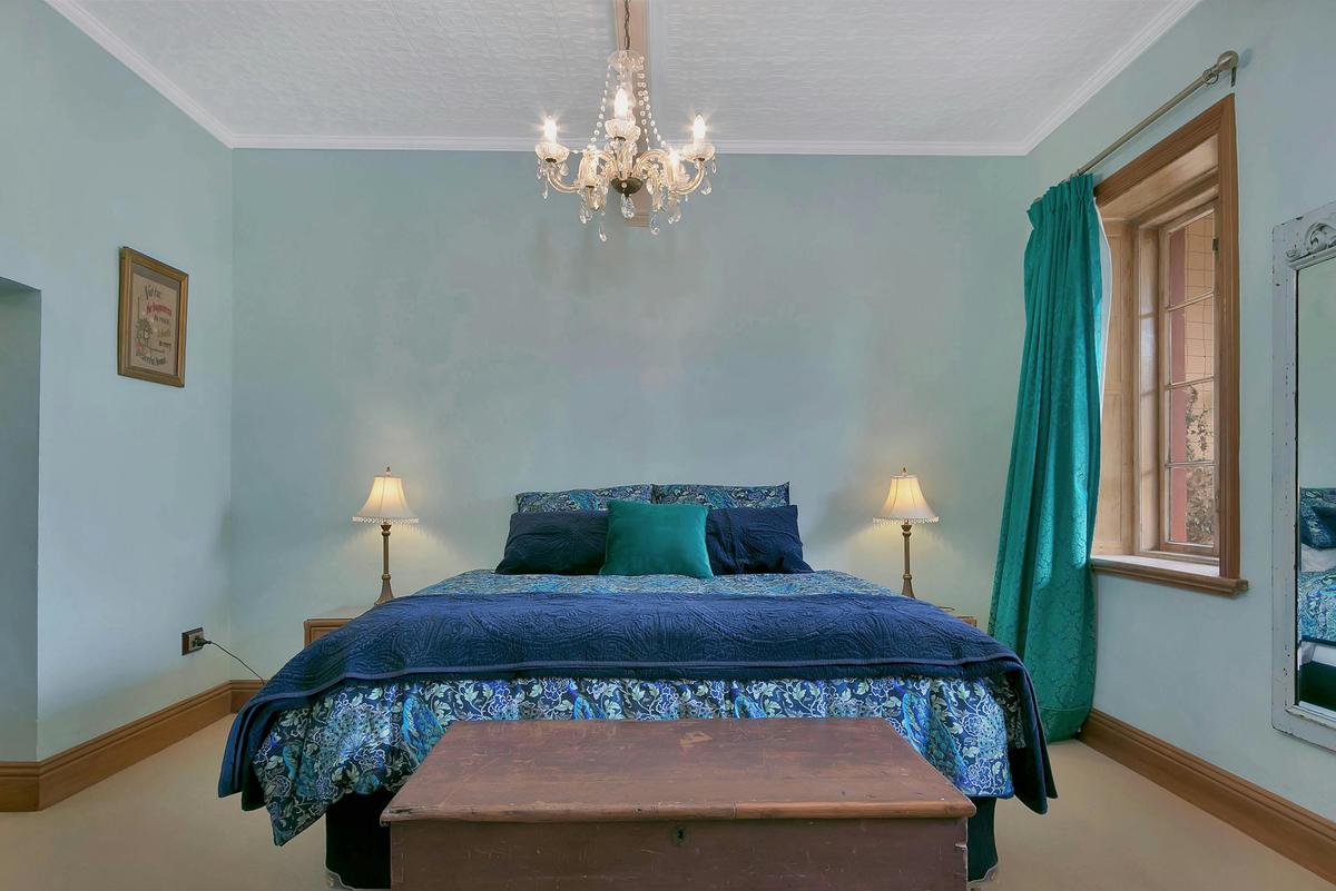 Ground floor master bedroom with king bed and luxury linen