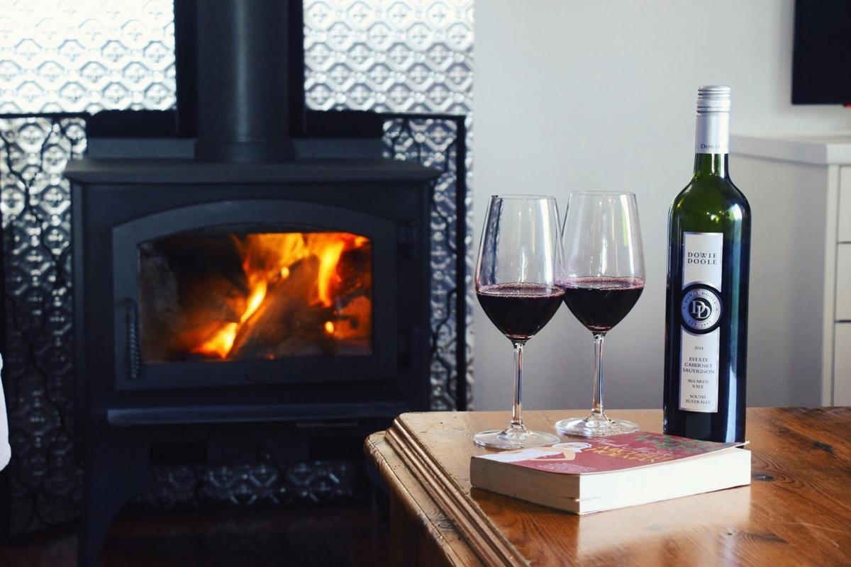 Enjoy a wine in front of the fire