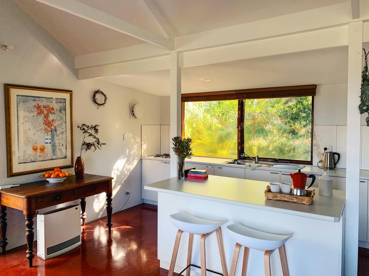 A well equipped kitchen with views onto the garden