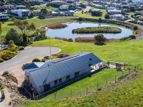 Lakeside Home with Birdlife and Sea Views