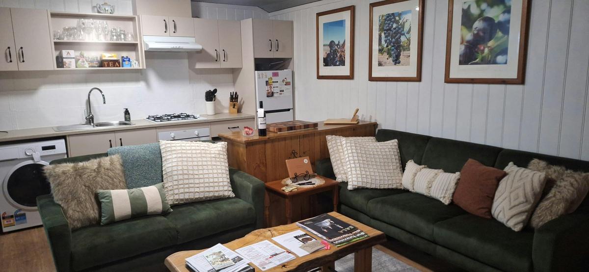 Cosy lounge at Little Para Cottage accommodation in Tanunda