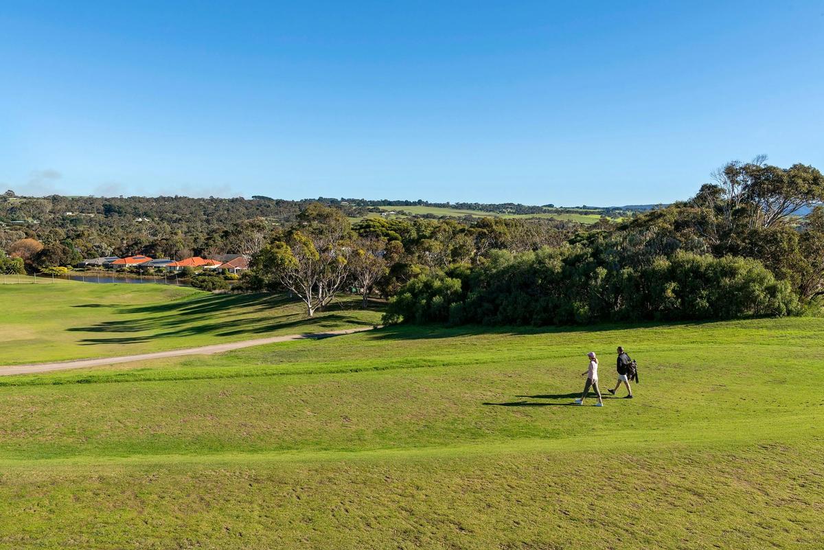 Golfers walking at McCracken Country Club Golf Course