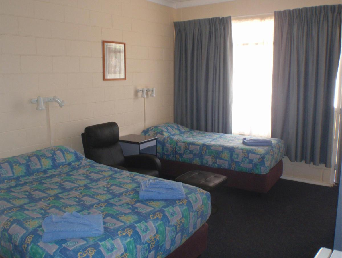 Twin room with electric massage chair