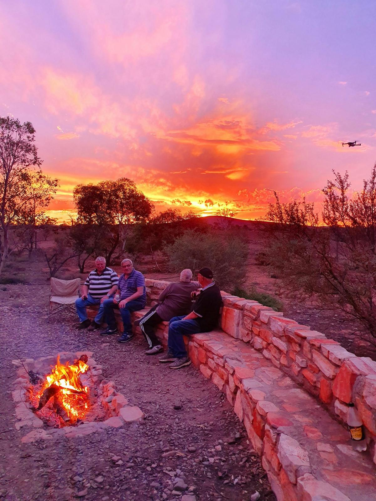 Take in a sunset whilst sitting around the fire