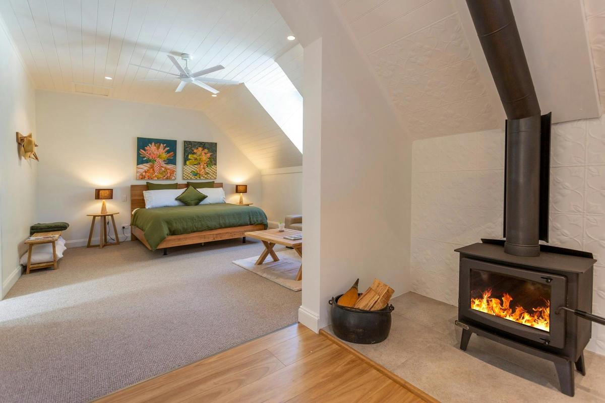 The accommodation has a cosy wood fire.