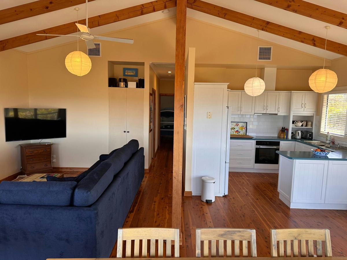 Air-conditioned lounge area and kitchen