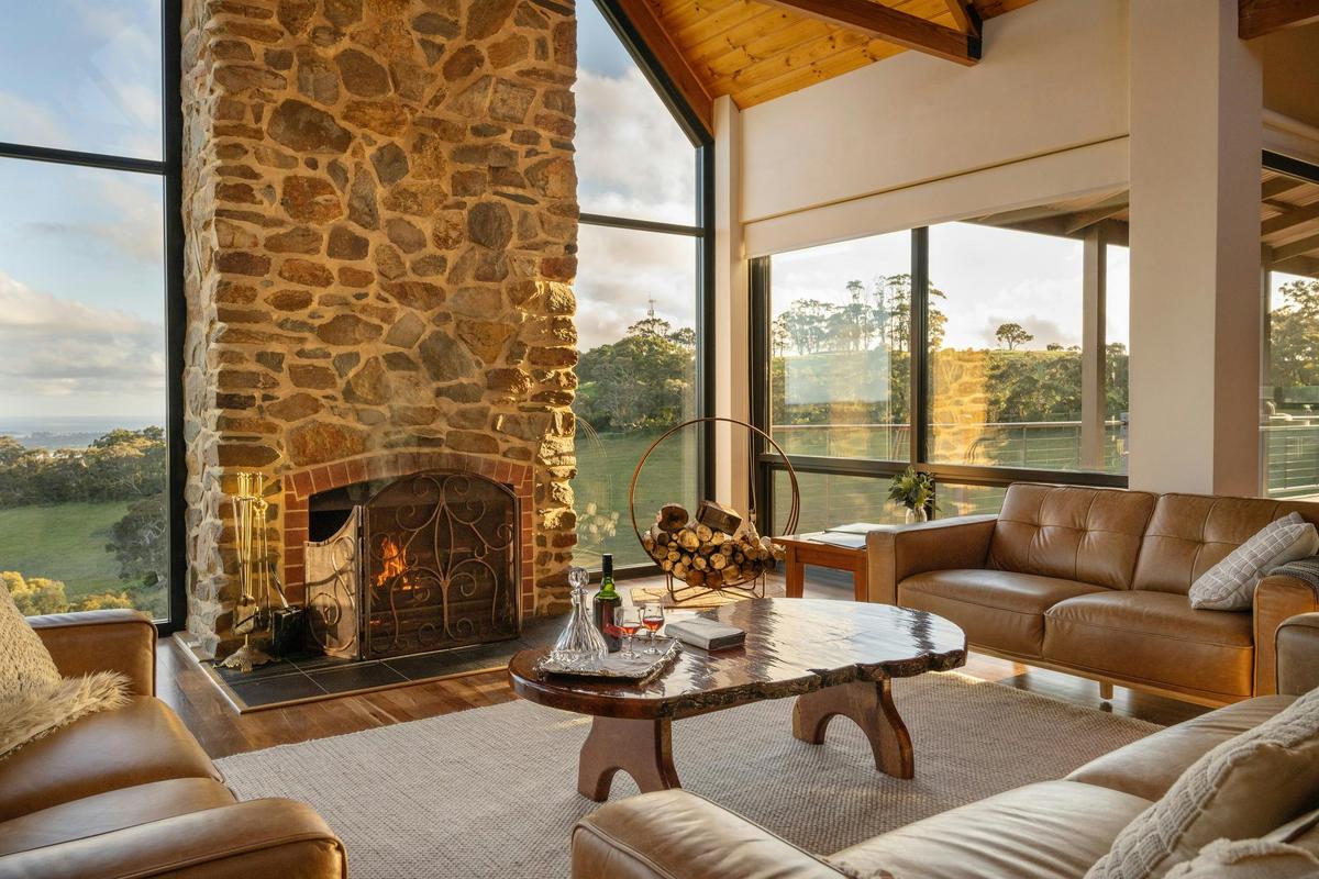 The local stone setting makes a gorgeous open fireplace in the lounge. And the views are stunning!!