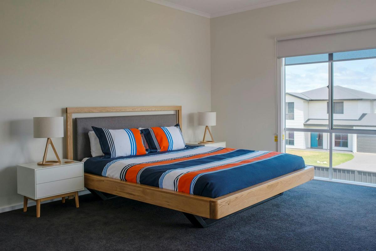Onshore Retreat Main Bedroom Upstairs with King Bed