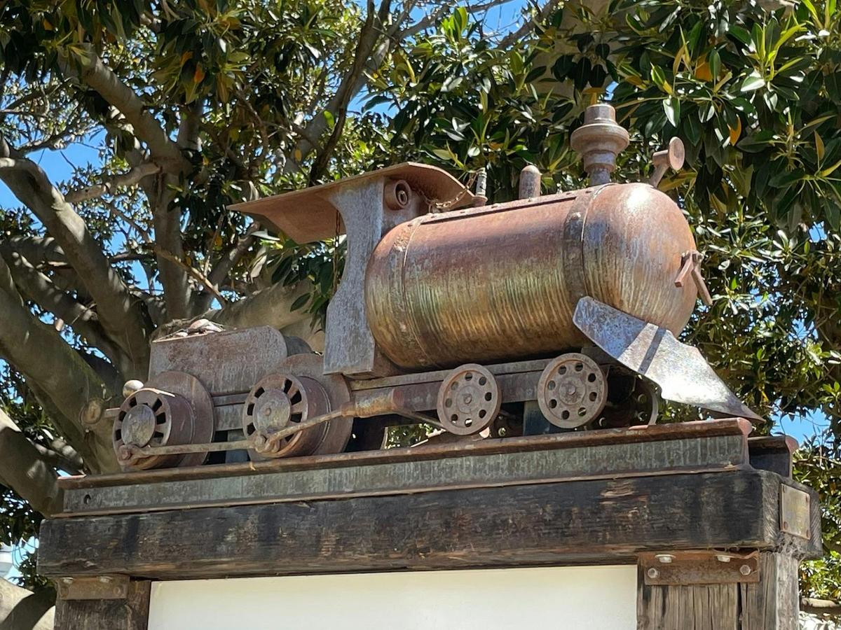A miniature train metal artwork.