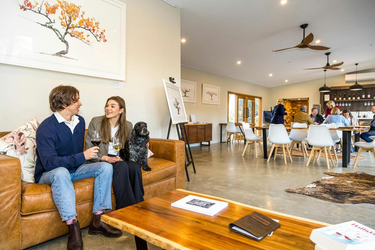 Whether at the lounge or one of the tasting tables, Poonawatta offers stunning views and cuddly dogs