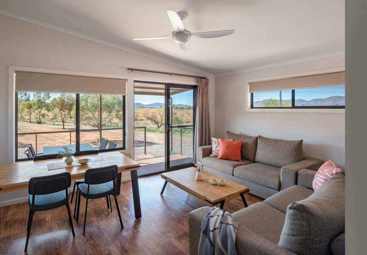 Open plan living and dining area of superior holiday units