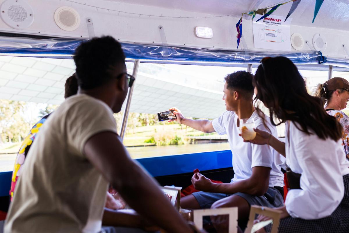 Passengers taking a selfie aboard The Popeye