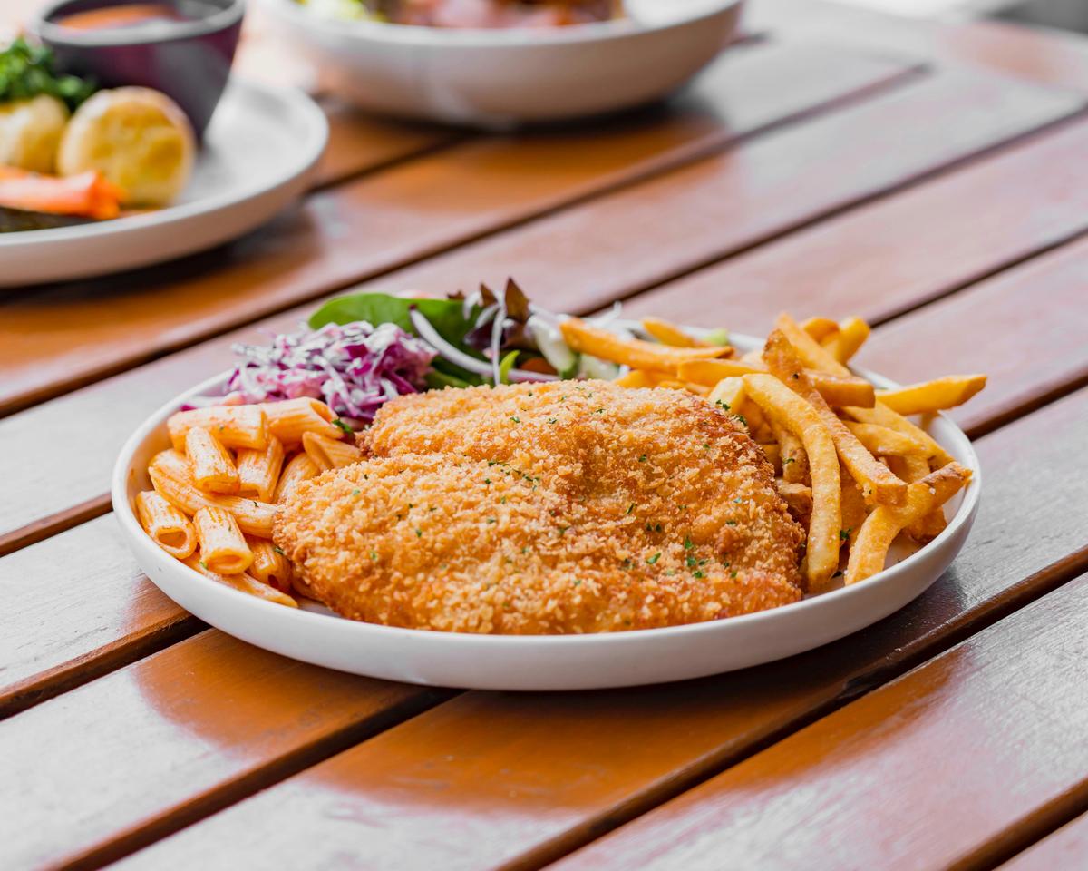 A classic schnitzel dish at the Pastoral Hotel Motel, perfect for a satisfying dining experience.