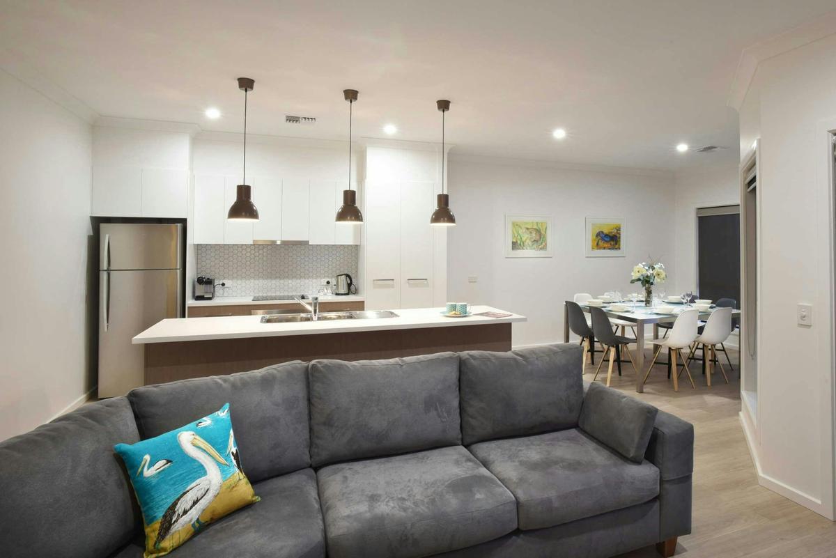 Spacious Kitchen, Dining and Living Area in Villa 48B with pool