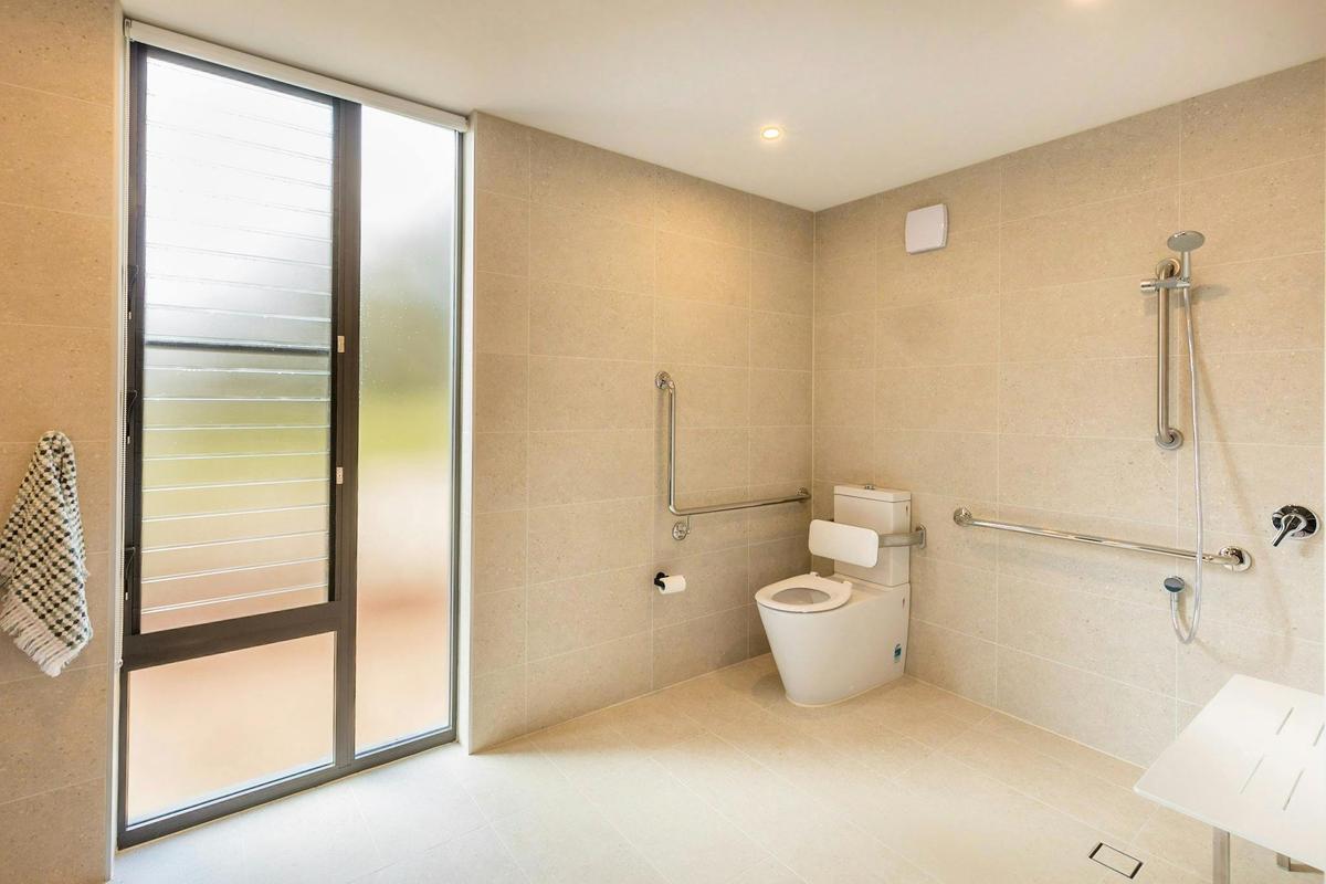 Bathroom with accessible toilet and shower