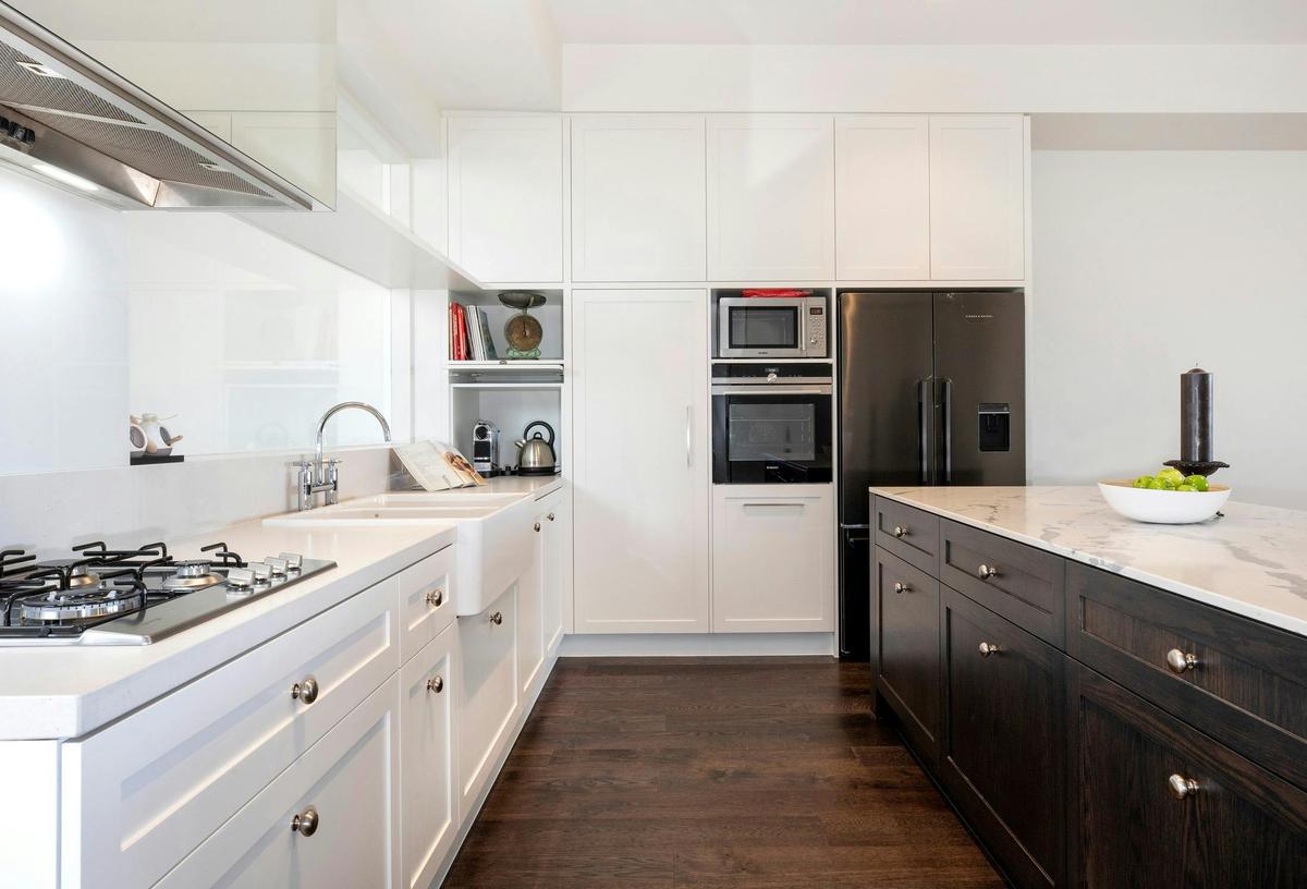 Cooking in the well appointed kitchen
