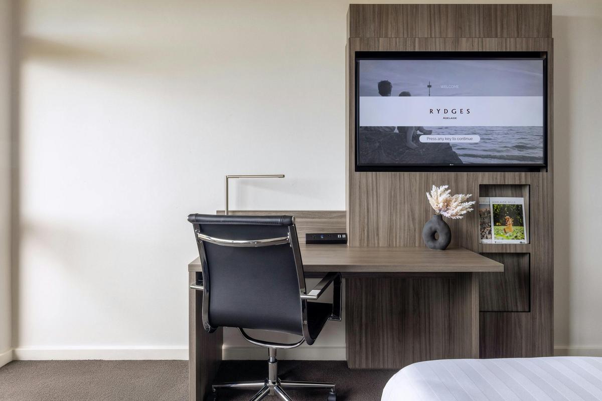 Tv with working desk and chair