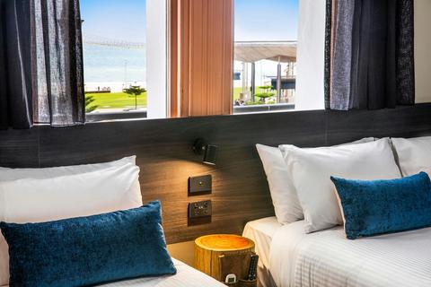 Studio Twin Queen, shared bathroom facilities