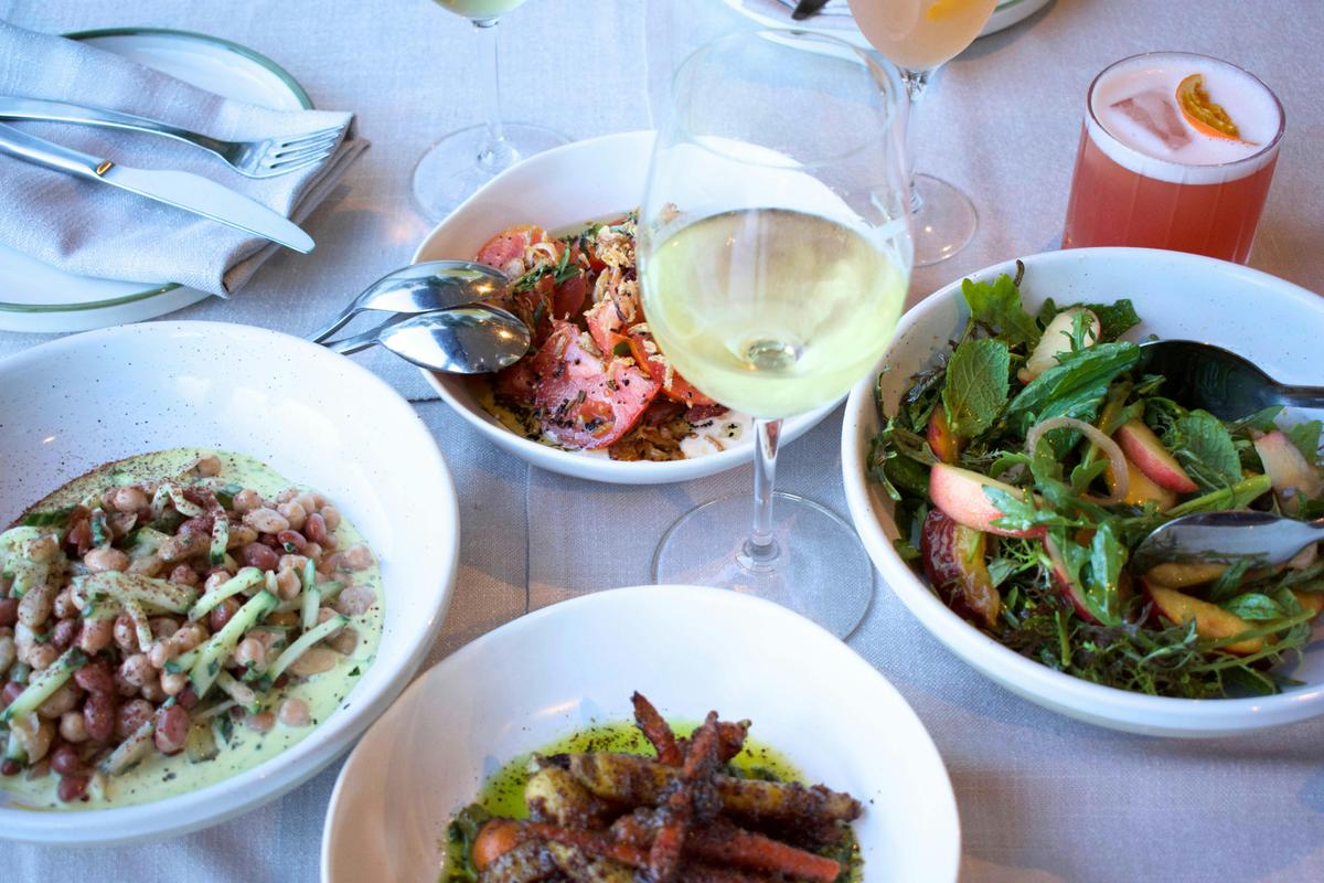 a selection of dishes from the seanoal small plates section of the menu