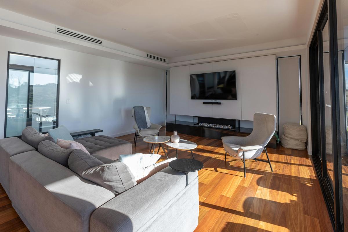 sunlit lounge area with fire