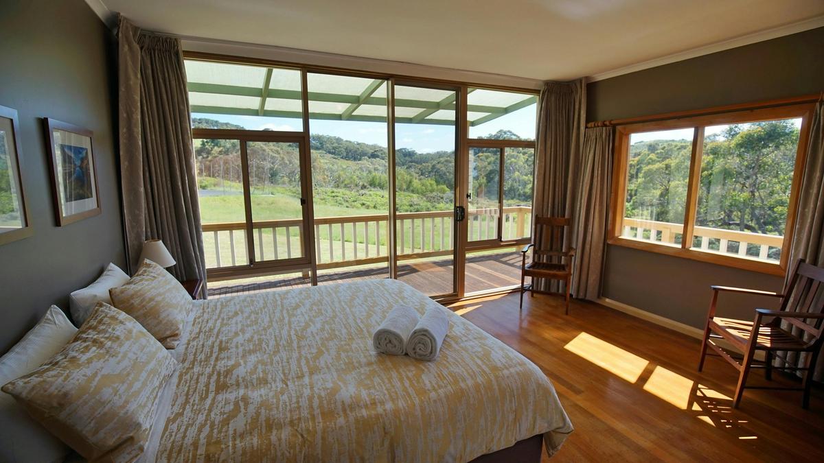 Deep Creek Homestead Master Bedroom overlooking spring fed creek