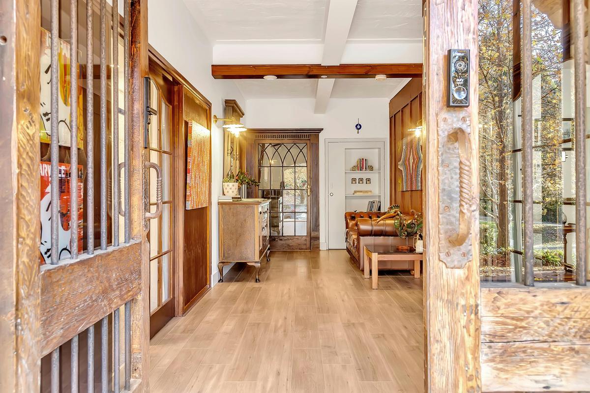 Enter through the beautiful doors to the foyer