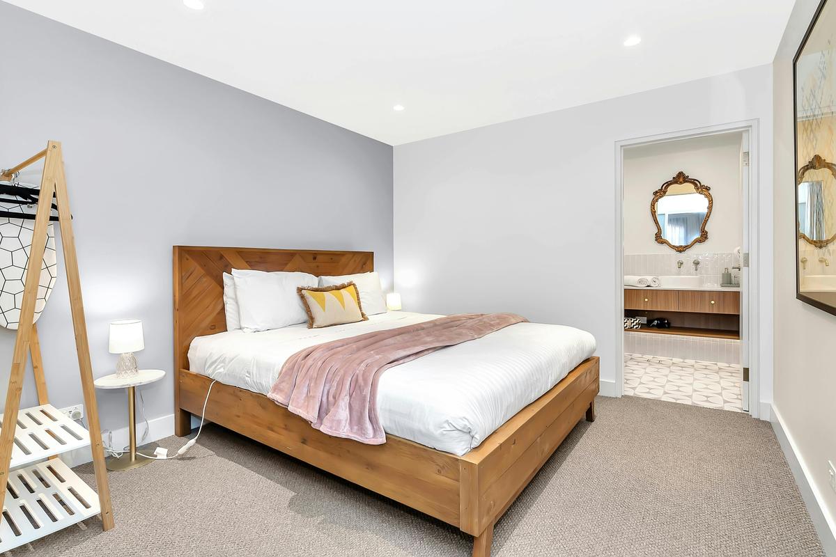 Luxurious king size bed with spacious private bathroom