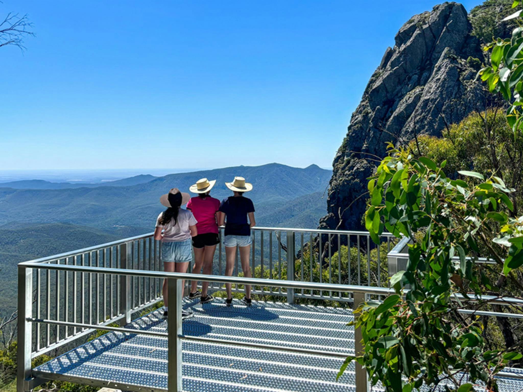 People admiring the view from West Kaputar Rock lookout, Mount Kaputar National Park. Photo: Louisa
