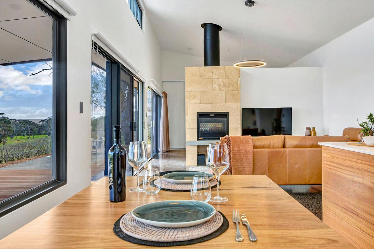 View from the dining table to the double sided fireplace