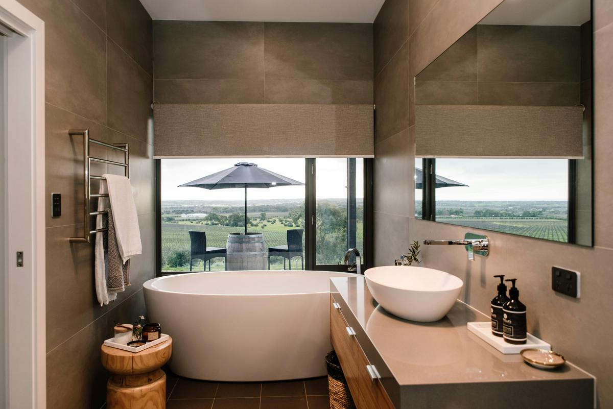 Relax in the bath tub overlooking the vineyards