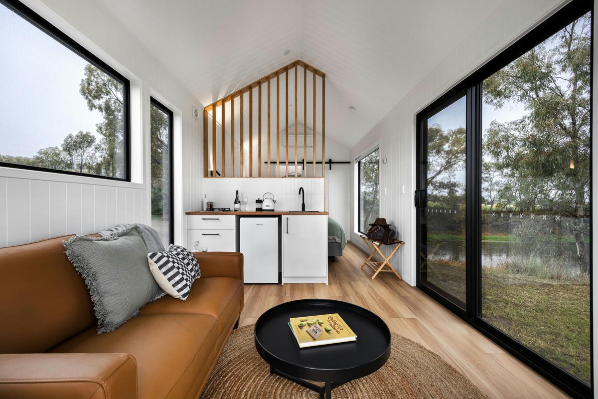 Inside open plan eco-cabin